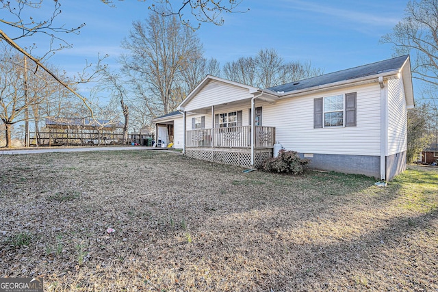 view of front of home featuring a porch and crawl space