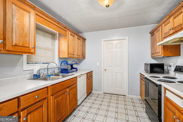 kitchen with light countertops, black electric range oven, stainless steel microwave, a sink, and dishwasher