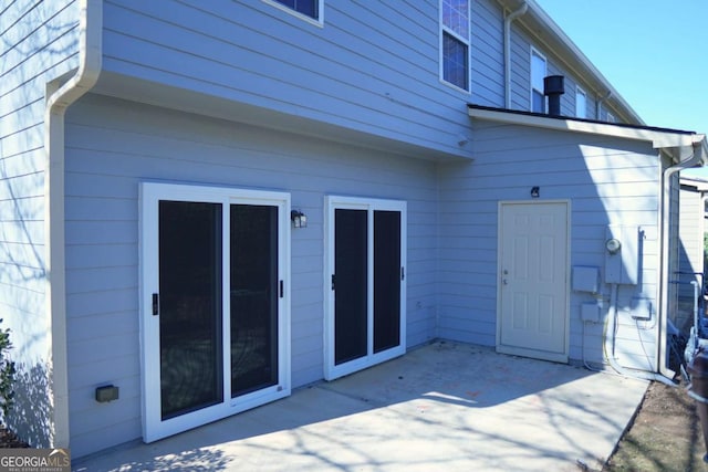 rear view of house with a patio area