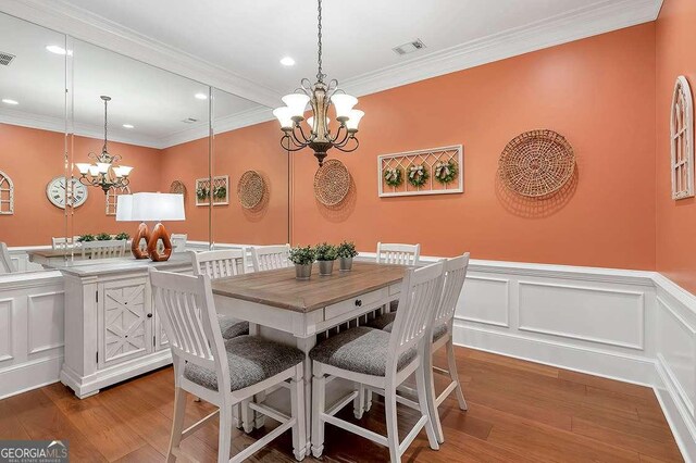 7524 Portbury Park Ln, Suwanee, GA 30024 - dining space with visible vents, a notable chandelier, and wood finished floors