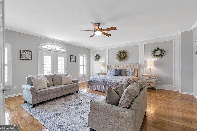 7524 Portbury Park Ln, Suwanee, GA 30024 - bedroom with ornamental molding, french doors, baseboards, and light wood finished floors