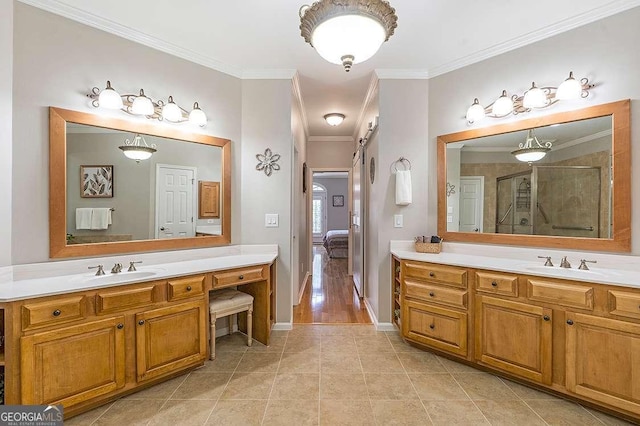 7524 Portbury Park Ln, Suwanee, GA 30024 - bathroom with crown molding, two vanities, connected bathroom, a sink, and tile patterned flooring