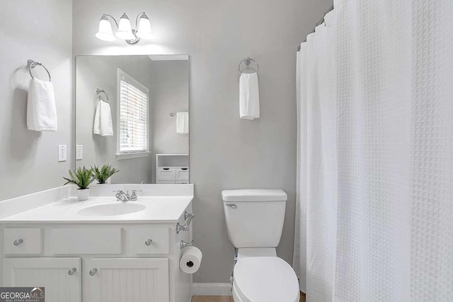 7524 Portbury Park Ln, Suwanee, GA 30024 - bathroom featuring vanity and toilet