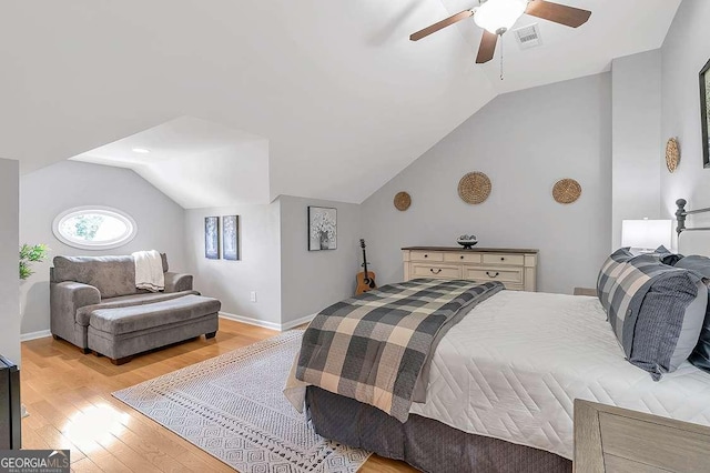 7524 Portbury Park Ln, Suwanee, GA 30024 - bedroom with lofted ceiling, visible vents, light wood-style floors, a ceiling fan, and baseboards