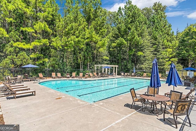 7524 Portbury Park Ln, Suwanee, GA 30024 - community pool featuring a patio area, fence, and a pergola