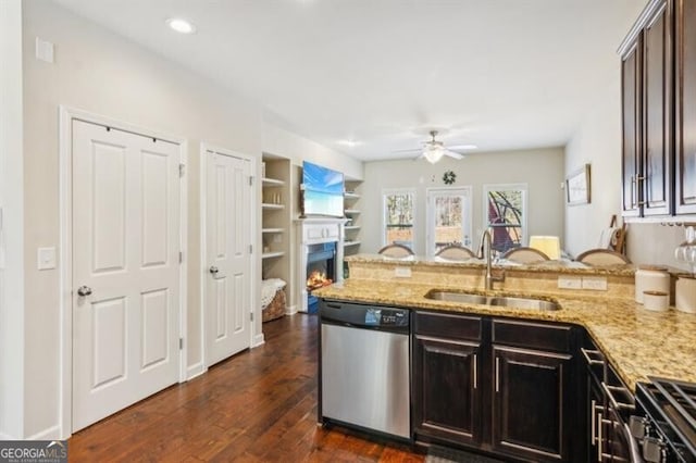 7420 Glisten Ave, Sandy Springs, GA 30328 - kitchen featuring a sink, dark brown cabinetry, light stone counters, and stainless steel dishwasher