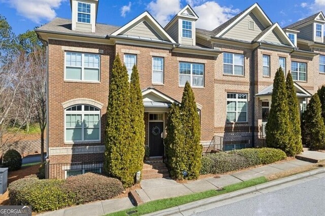 7420 Glisten Ave, Sandy Springs, GA 30328 - townhome / multi-family property featuring brick siding
