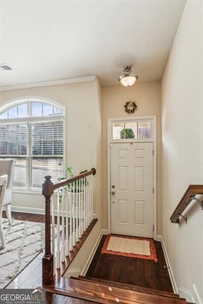 7420 Glisten Ave, Sandy Springs, GA 30328 - entrance foyer featuring wood finished floors and baseboards