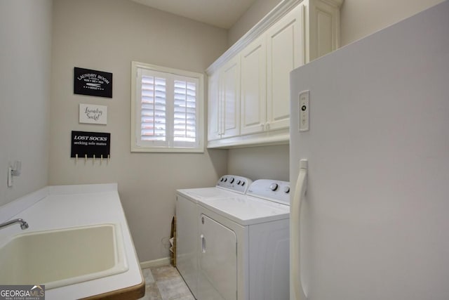 8910 Champion Ct, Ball Ground, GA 30107 - laundry room with cabinet space, independent washer and dryer, and baseboards