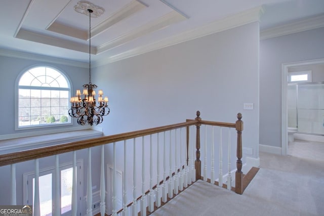 8910 Champion Ct, Ball Ground, GA 30107 - hall with an upstairs landing, crown molding, carpet, a chandelier, and baseboards