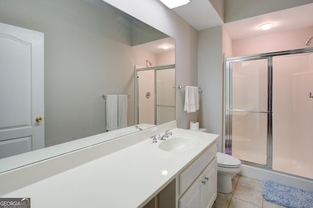 8910 Champion Ct, Ball Ground, GA 30107 - bathroom featuring toilet, a stall shower, vanity, and tile patterned flooring