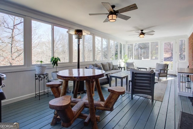 8910 Champion Ct, Ball Ground, GA 30107 - sunroom featuring a deck, hardwood / wood-style floors, and baseboards