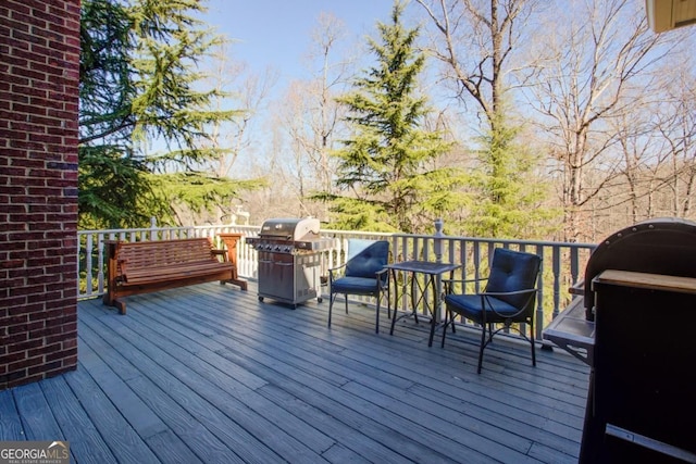 8910 Champion Ct, Ball Ground, GA 30107 - wooden terrace featuring grilling area