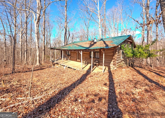 exterior space with log siding