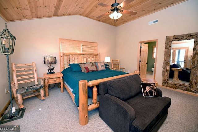 carpeted bedroom with wood ceiling, lofted ceiling, visible vents, and ensuite bathroom