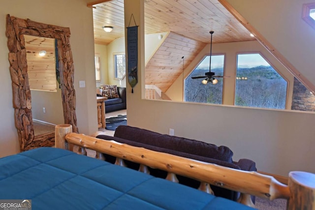 bedroom with wooden ceiling and vaulted ceiling