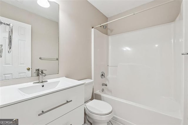 full bath with toilet, vanity, and shower / bathtub combination