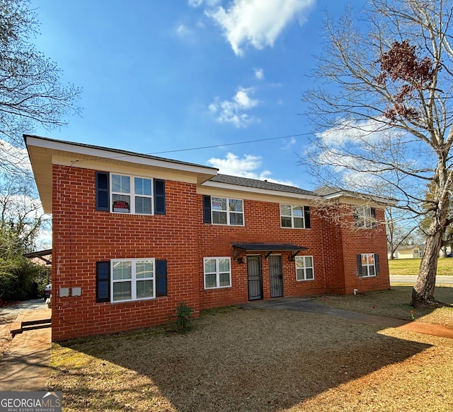 view of front of property with brick siding