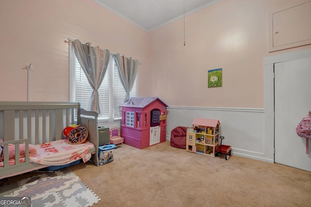 bedroom featuring crown molding and light colored carpet