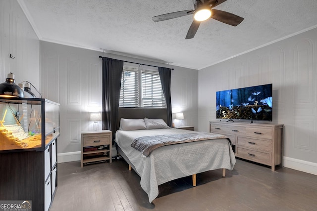 bedroom with a ceiling fan, dark wood-style flooring, crown molding, and a textured ceiling