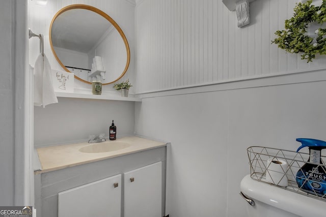 half bath with vanity and toilet