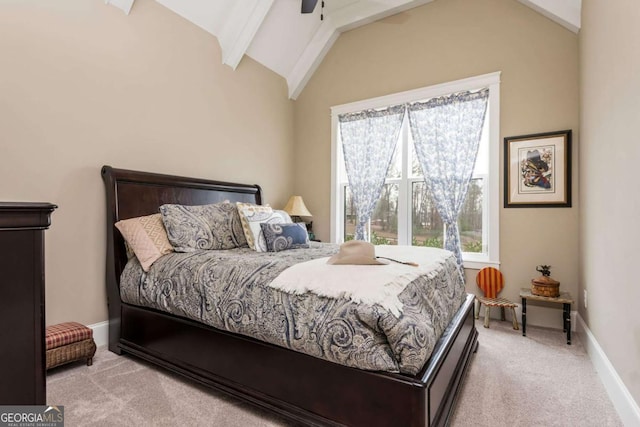 bedroom with vaulted ceiling with beams, ceiling fan, baseboards, and light colored carpet