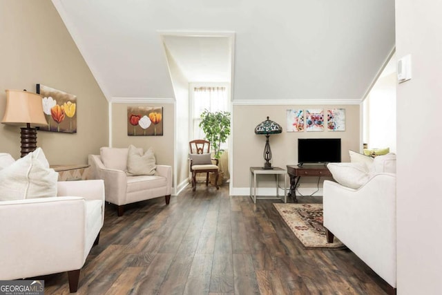 living area with vaulted ceiling, baseboards, and dark wood finished floors