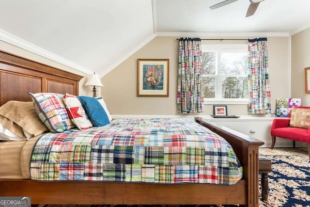 bedroom featuring crown molding, vaulted ceiling, and a ceiling fan