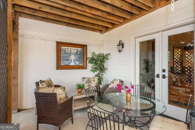 view of patio with french doors and outdoor dining area