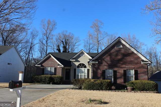 view of front facade featuring brick siding