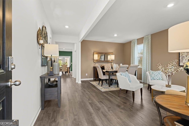 foyer featuring recessed lighting, dark wood finished floors, and baseboards