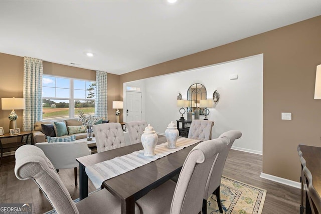 dining area with dark wood-style floors, recessed lighting, and baseboards