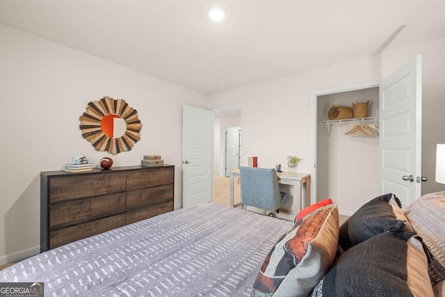 bedroom featuring a closet and recessed lighting