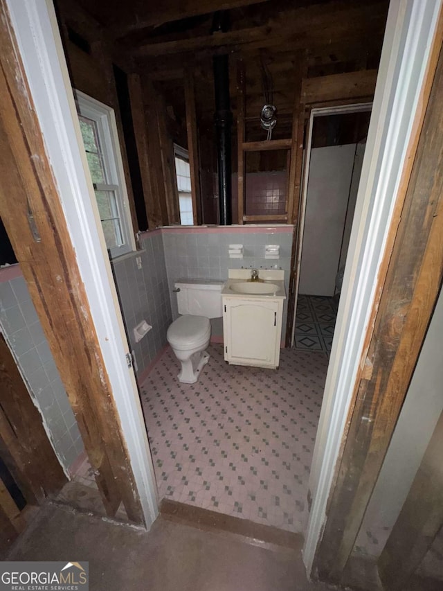 3518 Hamlin Cir, Atlanta, GA 30341 - half bathroom with vanity and tile walls