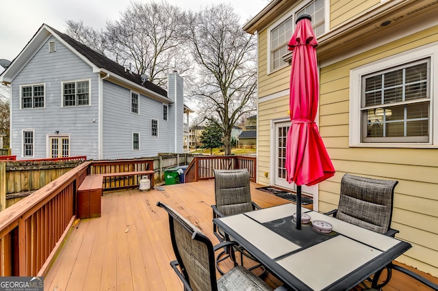 deck with outdoor dining space