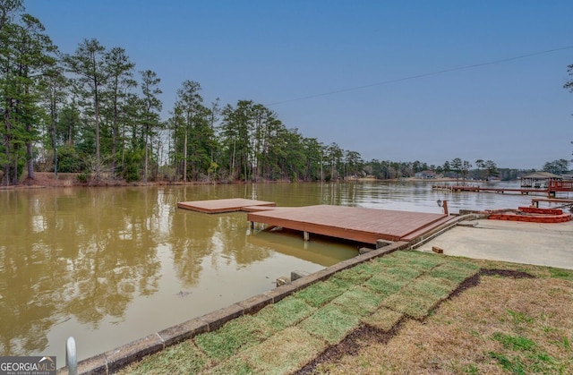 view of dock with a water view