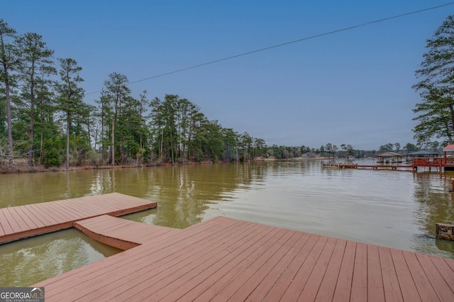 view of dock with a water view