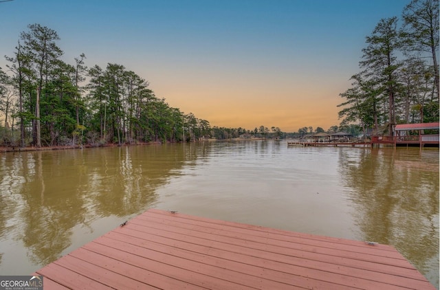 view of dock with a water view