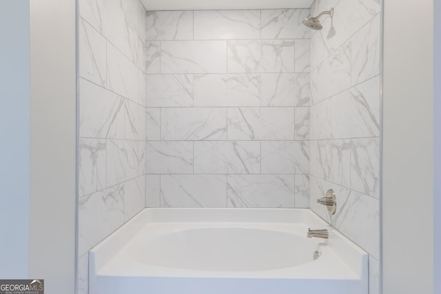 bathroom with shower / bathing tub combination