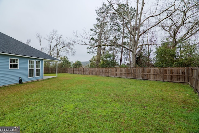 view of yard featuring a fenced backyard