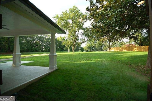 view of yard featuring fence