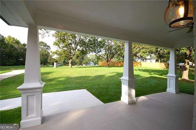 view of patio featuring ceiling fan