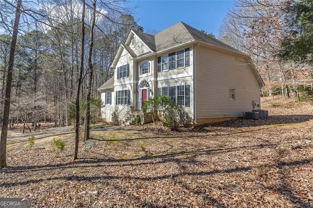 view of front of property with central AC unit