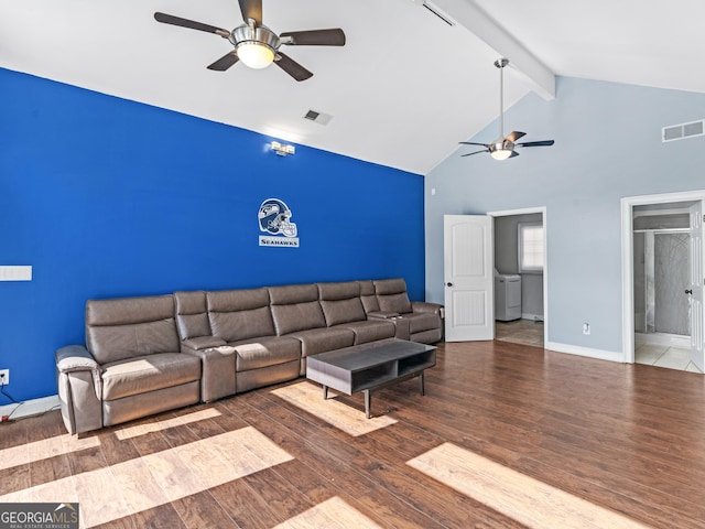 living room featuring visible vents and wood finished floors