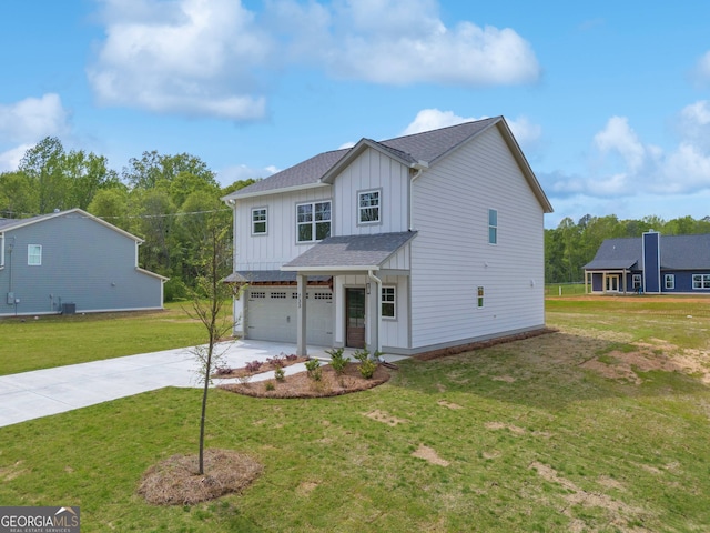 view of front of property with a garage, a shingled roof, concrete driveway, a front lawn, and board and batten siding