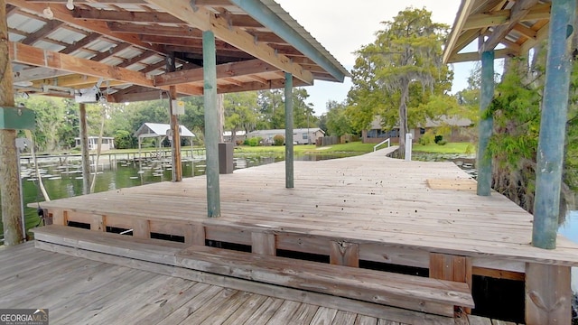 view of dock with a water view