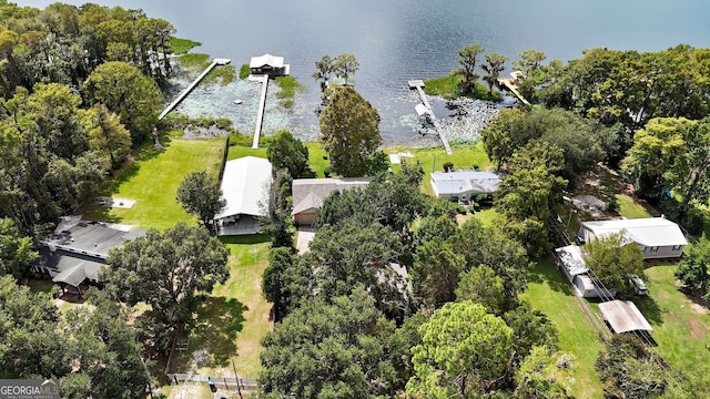 drone / aerial view with a water view