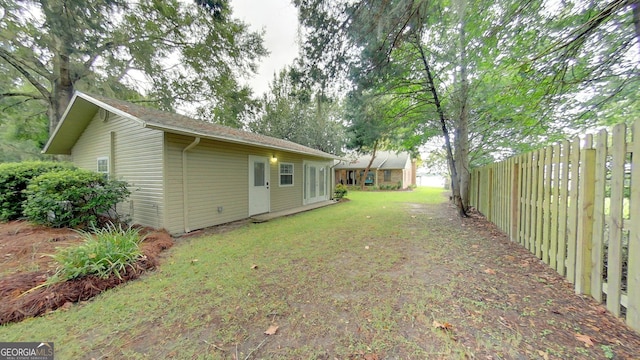 view of yard featuring fence