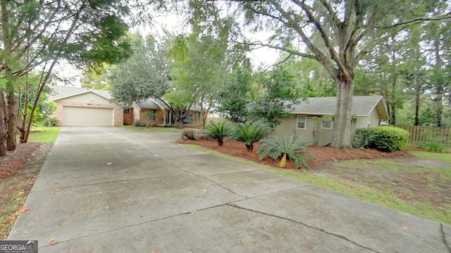 single story home with fence