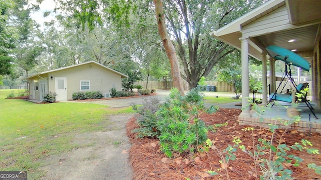 view of yard with a patio and fence